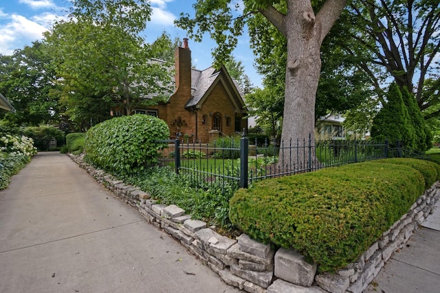 9 Harwood Pl, Bloomington, IL 61701 - view of front of property with a chimney and brick siding