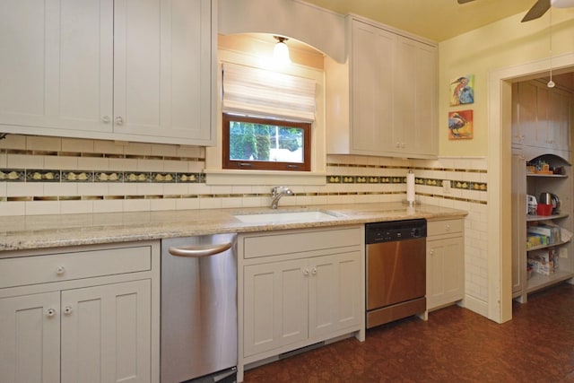 9 Harwood Pl, Bloomington, IL 61701 - kitchen with dishwasher, ceiling fan, backsplash, and light stone counters