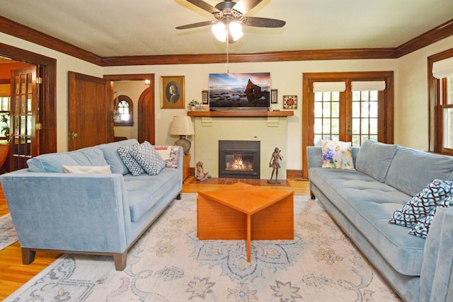 9 Harwood Pl, Bloomington, IL 61701 - living room with wood finished floors, a ceiling fan, crown molding, and a glass covered fireplace
