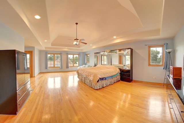 4914 W 82nd St, Burbank, IL 60459 - bedroom featuring a raised ceiling, light wood finished floors, multiple windows, and recessed lighting