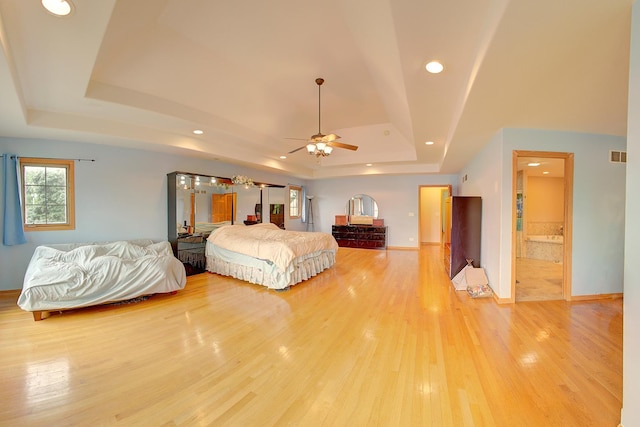 4914 W 82nd St, Burbank, IL 60459 - bedroom with a tray ceiling, light wood finished floors, and recessed lighting