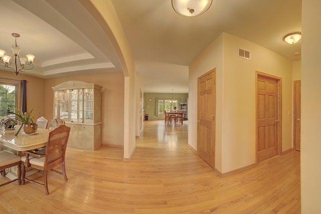 4914 W 82nd St, Burbank, IL 60459 - dining area featuring a chandelier and light wood finished floors