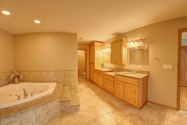 4914 W 82nd St, Burbank, IL 60459 - full bath with double vanity, a whirlpool tub, tile patterned flooring, and recessed lighting