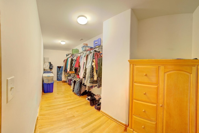 4914 W 82nd St, Burbank, IL 60459 - walk in closet with light wood-type flooring