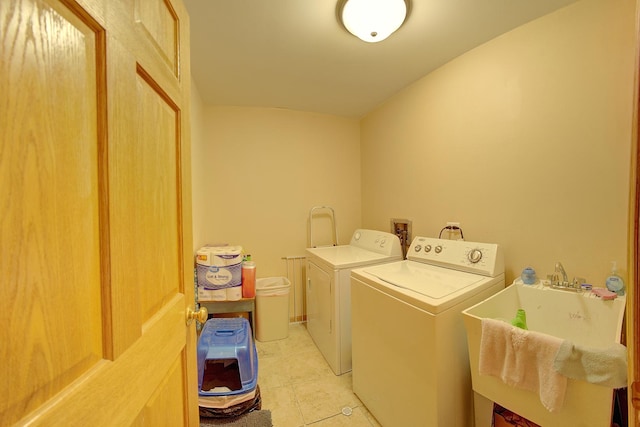 4914 W 82nd St, Burbank, IL 60459 - laundry area featuring washing machine and dryer and light tile patterned flooring