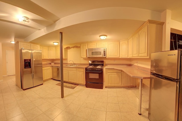 4914 W 82nd St, Burbank, IL 60459 - kitchen featuring stainless steel appliances and light countertops