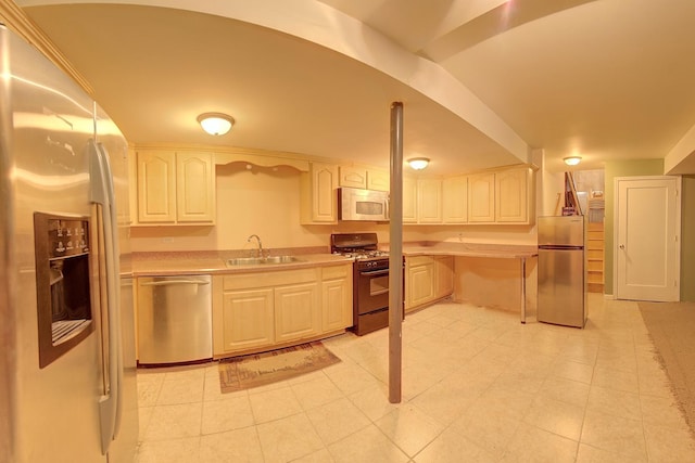 4914 W 82nd St, Burbank, IL 60459 - kitchen featuring stainless steel appliances, light countertops, and light tile patterned floors