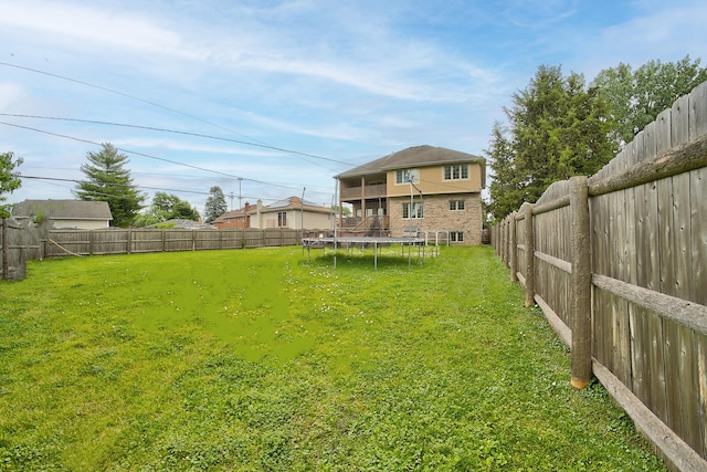 4914 W 82nd St, Burbank, IL 60459 - fenced backyard featuring a trampoline