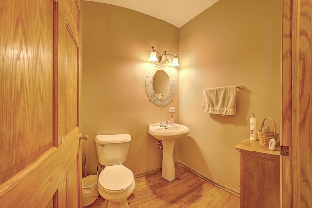 4914 W 82nd St, Burbank, IL 60459 - bathroom with wood finished floors and toilet