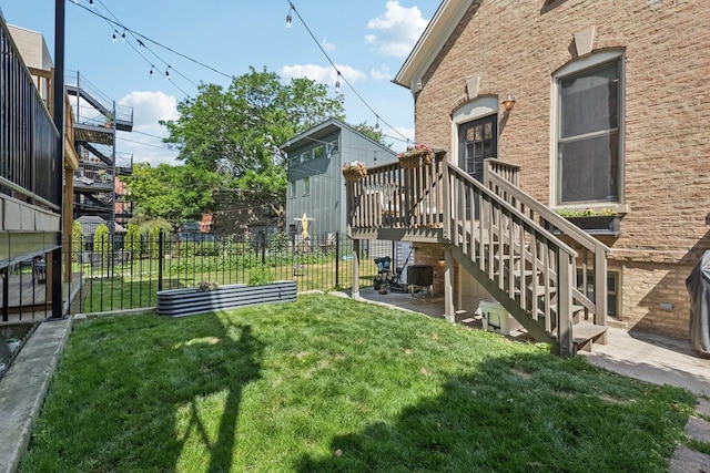 2118 W Schiller St Unit Ch, Chicago, IL 60622 - view of yard with stairs and a vegetable garden