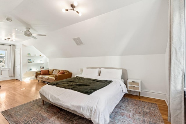 2118 W Schiller St Unit Ch, Chicago, IL 60622 - bedroom with vaulted ceiling, wood finished floors, and ceiling fan