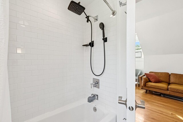 2118 W Schiller St Unit Ch, Chicago, IL 60622 - bathroom featuring shower / bath combination with curtain and wood finished floors