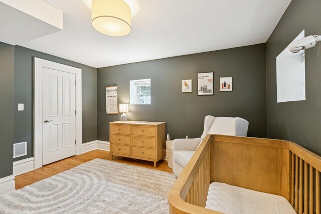 2118 W Schiller St Unit Ch, Chicago, IL 60622 - bedroom featuring wood finished floors and baseboards