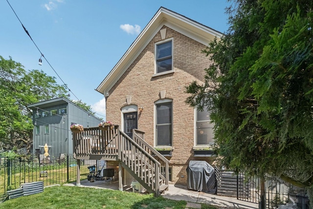 2118 W Schiller St Unit Ch, Chicago, IL 60622 - view of front of home with brick siding and a patio