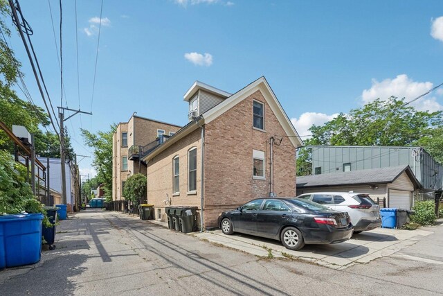 2118 W Schiller St Unit Ch, Chicago, IL 60622 - view of property exterior with brick siding