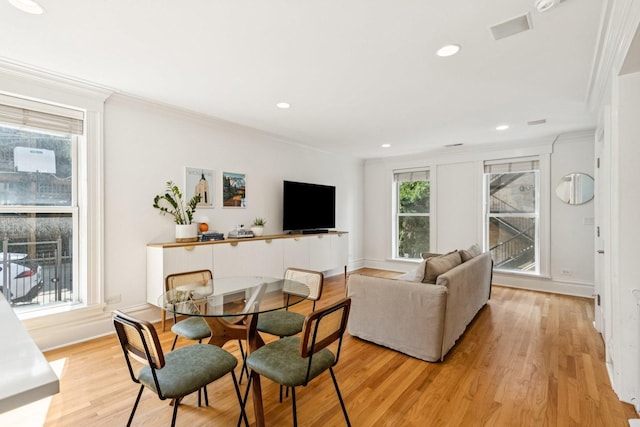 2118 W Schiller St Unit Ch, Chicago, IL 60622 - dining space featuring crown molding, light wood-type flooring, and recessed lighting