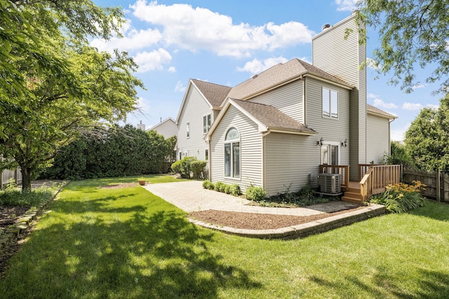 1304 Sheffield Ct, Carol Stream, IL 60188 - back of house featuring a chimney, roof with shingles, and a deck