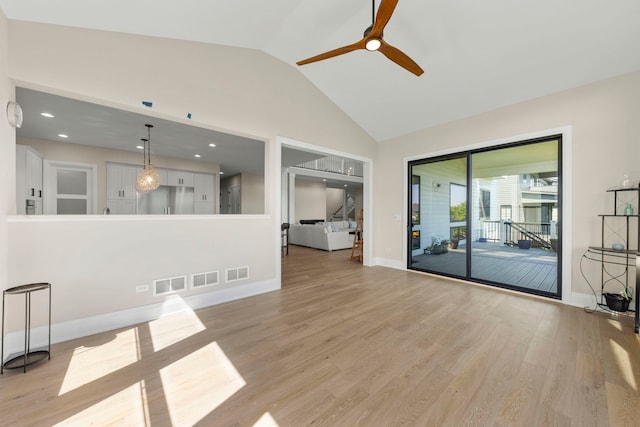 4216 Carpenter Rd, Naperville, IL 60564 - unfurnished room with light wood finished floors, ceiling fan, and high vaulted ceiling