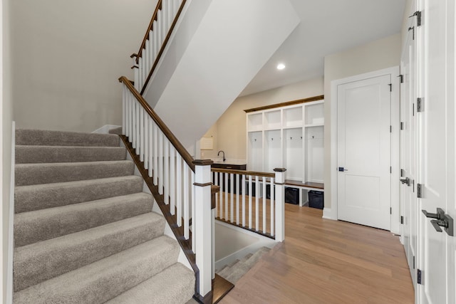 4216 Carpenter Rd, Naperville, IL 60564 - stairway with wood finished floors and recessed lighting