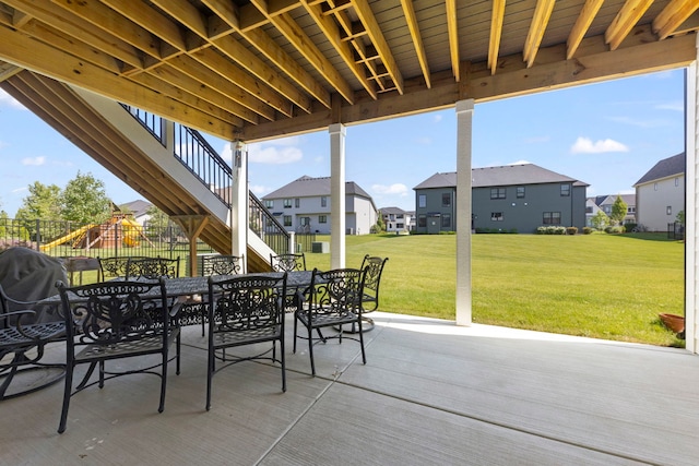 4216 Carpenter Rd, Naperville, IL 60564 - view of patio / terrace with outdoor dining area, stairway, a residential view, a playground, and a wooden deck