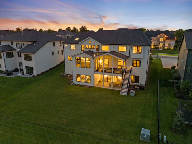 4216 Carpenter Rd, Naperville, IL 60564 - back of house featuring a patio, a residential view, stairs, and a wooden deck