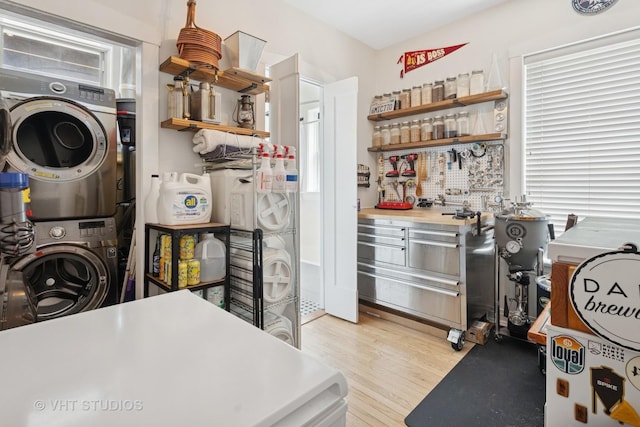 5245 N Winthrop Ave Unit 3S, Chicago, IL 60640 - laundry area featuring estacked washer and dryer and light wood-style floors