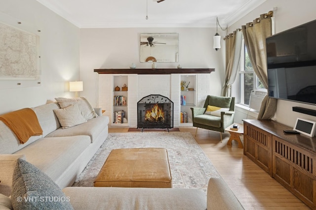5245 N Winthrop Ave Unit 3S, Chicago, IL 60640 - living area with wood finished floors, ceiling fan, ornamental molding, a brick fireplace, and cooling unit