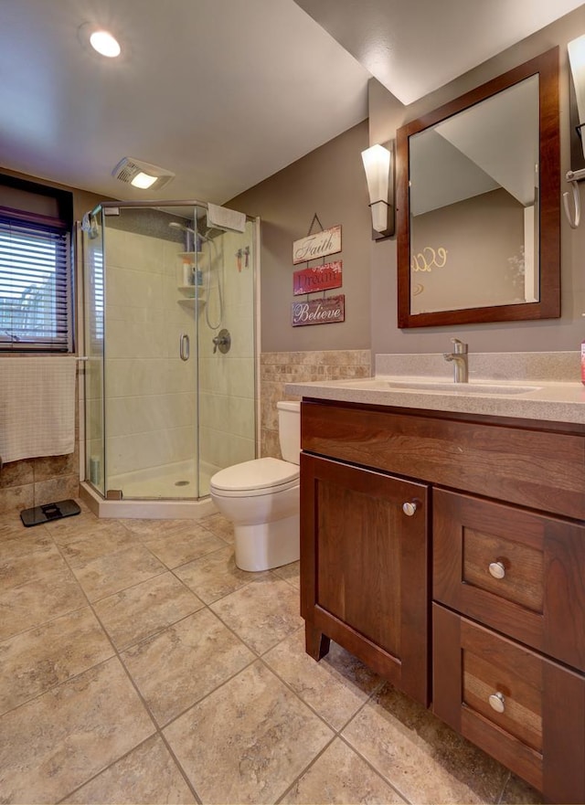 1213 Rose Ct, Bartlett, IL 60103 - full bath with vanity, tile patterned floors, a stall shower, and tile walls