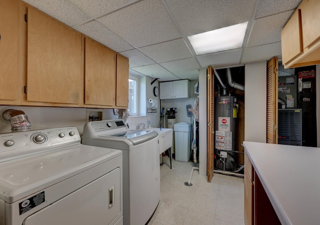 1213 Rose Ct, Bartlett, IL 60103 - laundry area with washer and clothes dryer, gas water heater, cabinet space, and light flooring