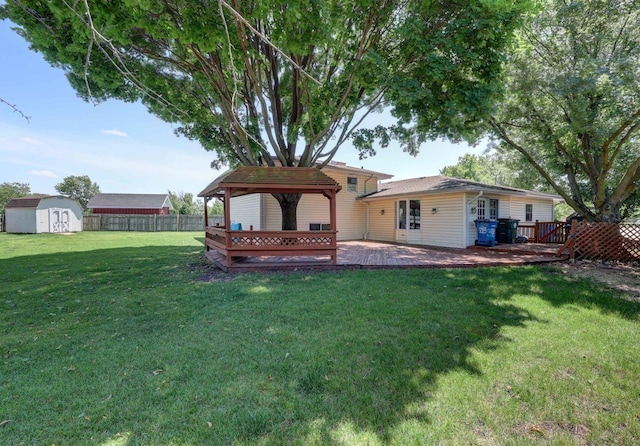 1213 Rose Ct, Bartlett, IL 60103 - view of yard with a storage shed and a deck
