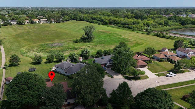 1213 Rose Ct, Bartlett, IL 60103 - aerial view of property and surrounding area featuring nearby suburban area, a large body of water, and a local golf course