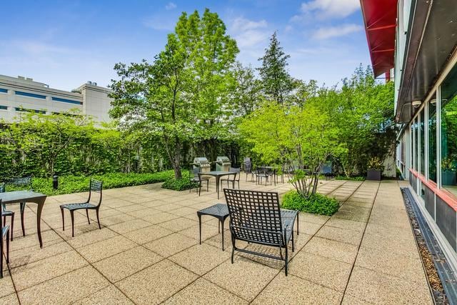 800 Elgin Rd Unit 1406, Evanston, IL 60201 - view of patio featuring outdoor dining space