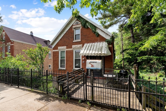 2421 W 21st Pl, Chicago, IL 60608 - view of front of property featuring brick siding and a fenced front yard