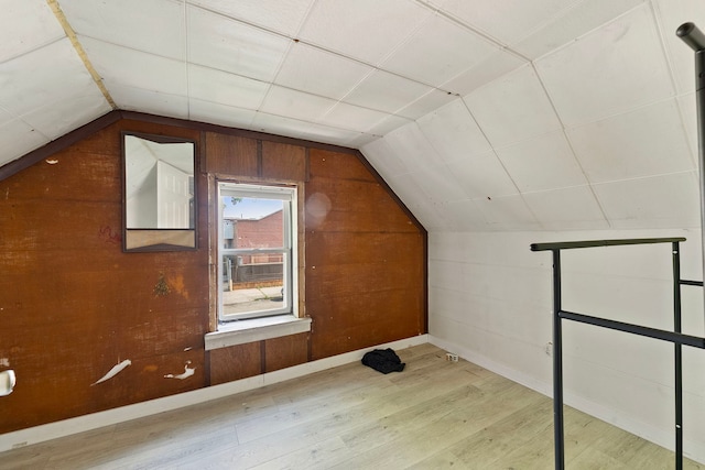 2421 W 21st Pl, Chicago, IL 60608 - bonus room featuring lofted ceiling, wood finished floors, and wooden walls