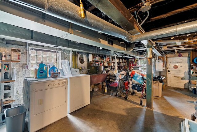 2421 W 21st Pl, Chicago, IL 60608 - below grade area featuring washing machine and dryer and electric panel