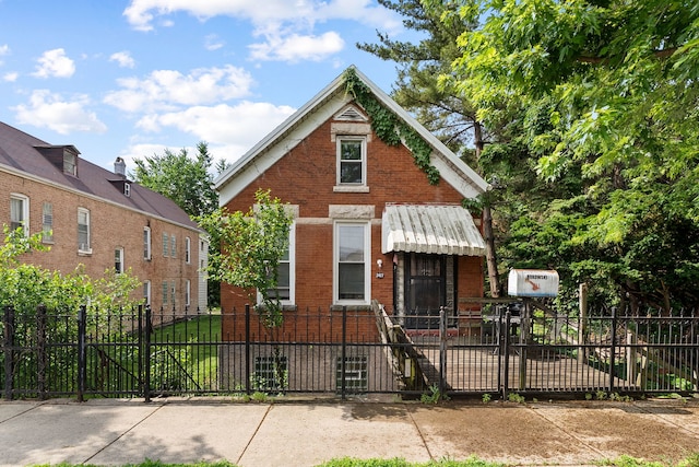 2421 W 21st Pl, Chicago, IL 60608 - view of front of house featuring brick siding and a fenced front yard