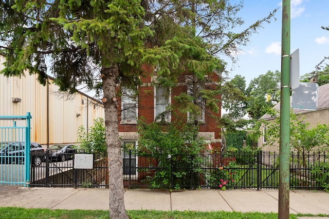 2421 W 21st Pl, Chicago, IL 60608 - view of building exterior with a fenced front yard