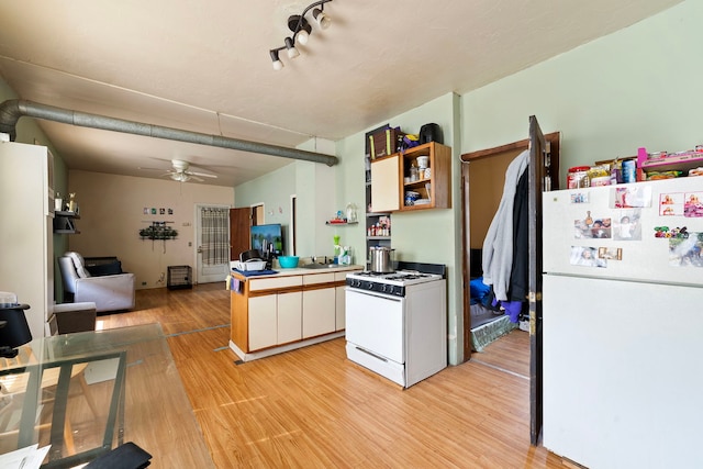 2421 W 21st Pl, Chicago, IL 60608 - kitchen featuring white appliances, a ceiling fan, light wood-style floors, open shelves, and open floor plan