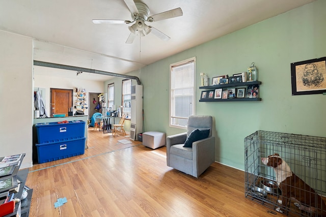2421 W 21st Pl, Chicago, IL 60608 - sitting room with ceiling fan and wood finished floors