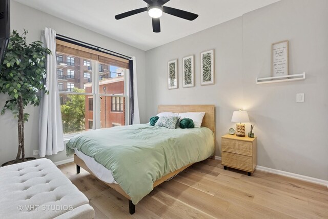 843 W College Pkwy, Chicago, IL 60608 - bedroom featuring light wood finished floors and ceiling fan