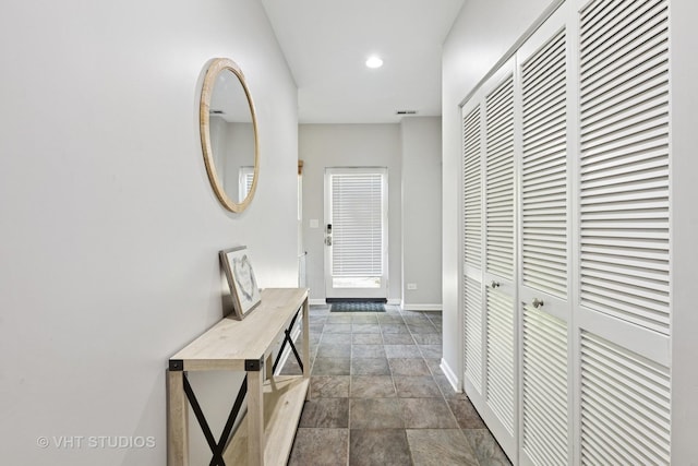 843 W College Pkwy, Chicago, IL 60608 - corridor with stone finish floors and recessed lighting