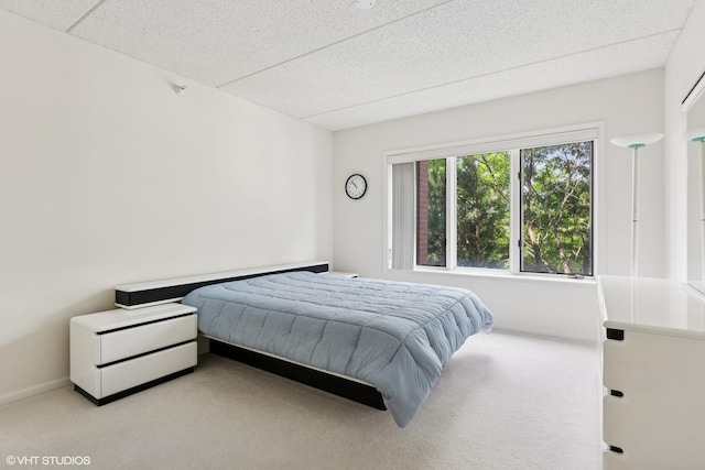 5055 W Madison St Unit 411, Skokie, IL 60077 - carpeted bedroom featuring a textured ceiling and baseboards