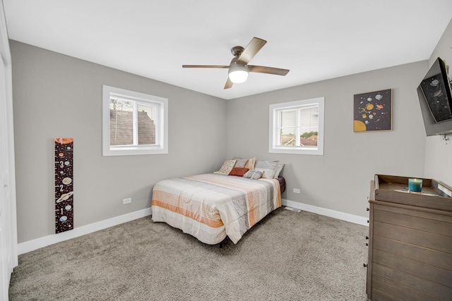 1028 N Lavergne Ave, Chicago, IL 60651 - bedroom featuring multiple windows, carpet floors, and ceiling fan
