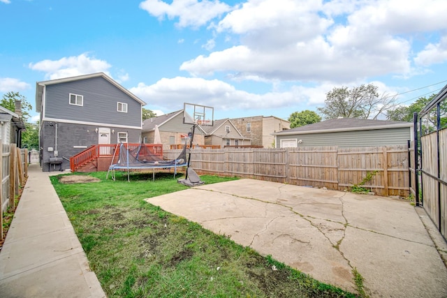 1028 N Lavergne Ave, Chicago, IL 60651 - view of sport court with a fenced backyard, a residential view, and a trampoline