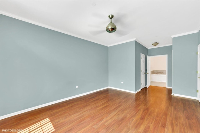 640 Mchenry Rd Unit 106, Wheeling, IL 60090 - spare room featuring ornamental molding, ceiling fan, and wood finished floors