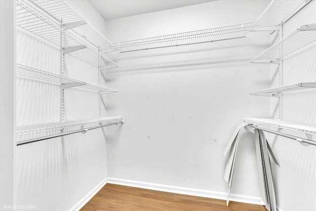 640 Mchenry Rd Unit 106, Wheeling, IL 60090 - spacious closet featuring wood finished floors