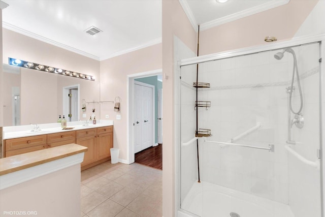 640 Mchenry Rd Unit 106, Wheeling, IL 60090 - bathroom featuring a stall shower, ornamental molding, double vanity, and tile patterned flooring
