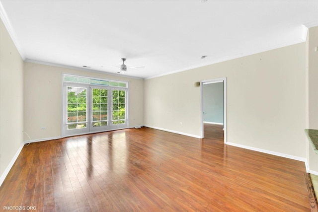 640 Mchenry Rd Unit 106, Wheeling, IL 60090 - spare room featuring a ceiling fan, ornamental molding, and hardwood / wood-style flooring