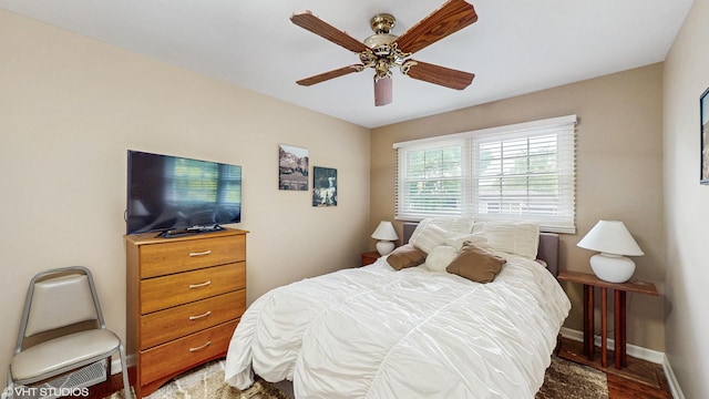 1502 S Fernandez Ave, Arlington Heights, IL 60005 - bedroom with a ceiling fan and light wood finished floors