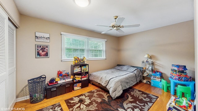 1502 S Fernandez Ave, Arlington Heights, IL 60005 - bedroom featuring a closet, wood finished floors, and a ceiling fan